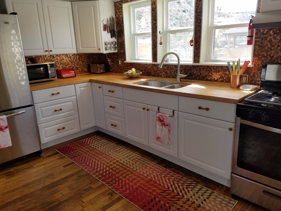 A full kitchen with stainless appliances and everything you could possibly need.