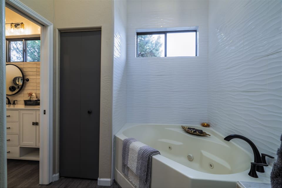 The jacuzzi tub provides relaxation for guests after a day of hiking.