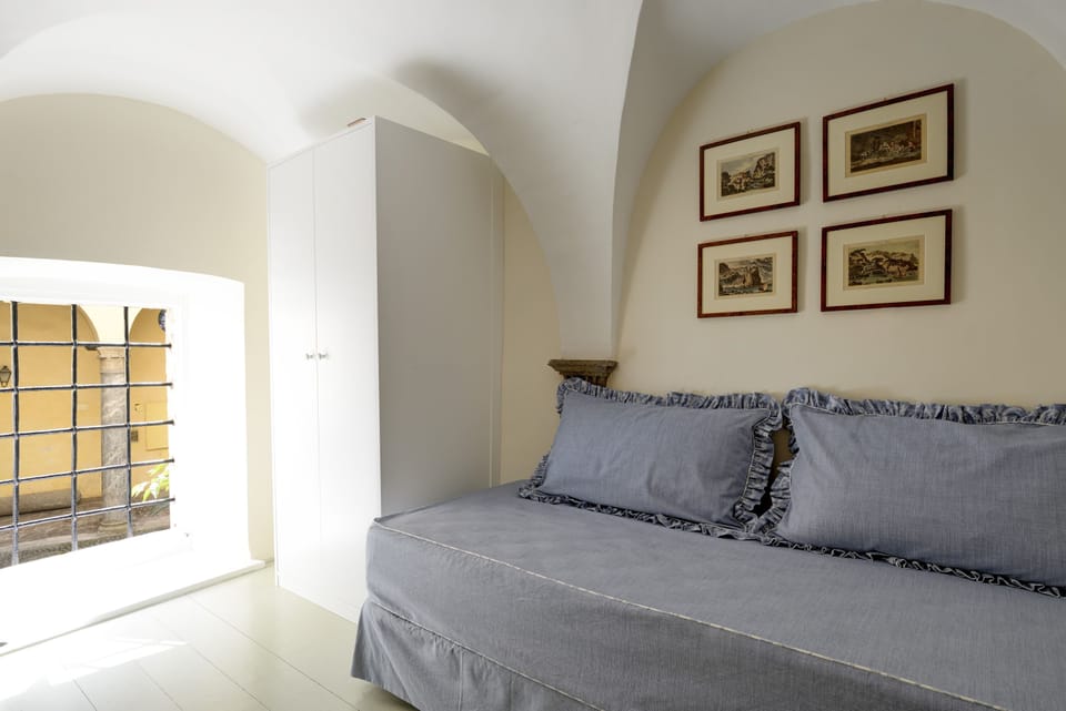 The additional single bed.