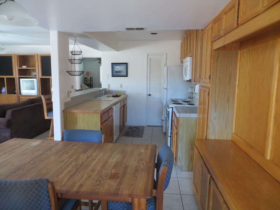dining area, kitchen and living room