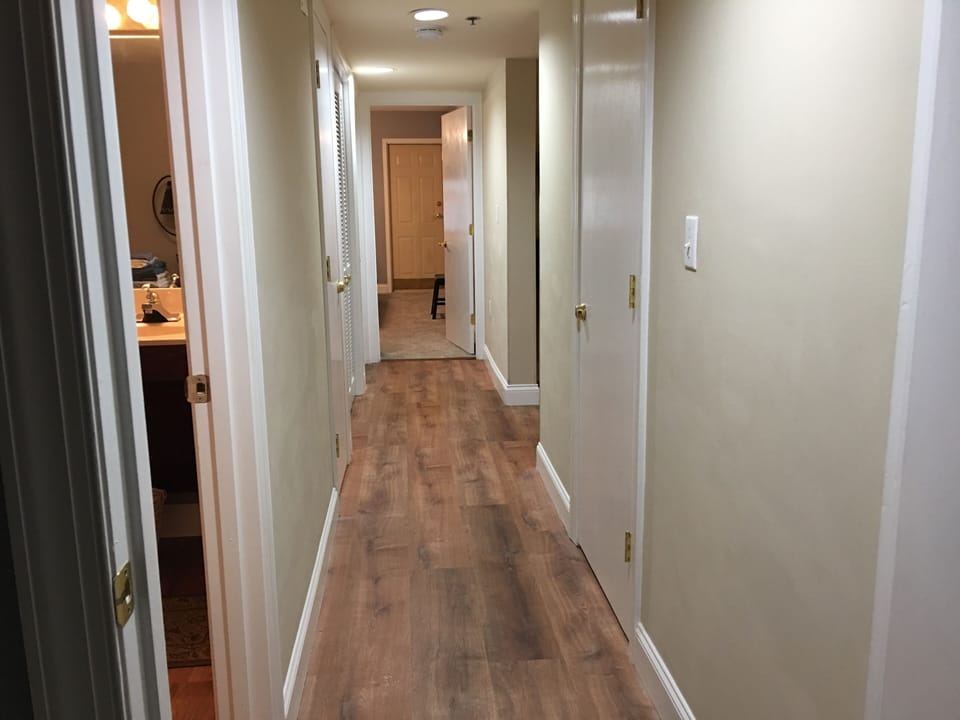 Long hallway between the 2 bedrooms.