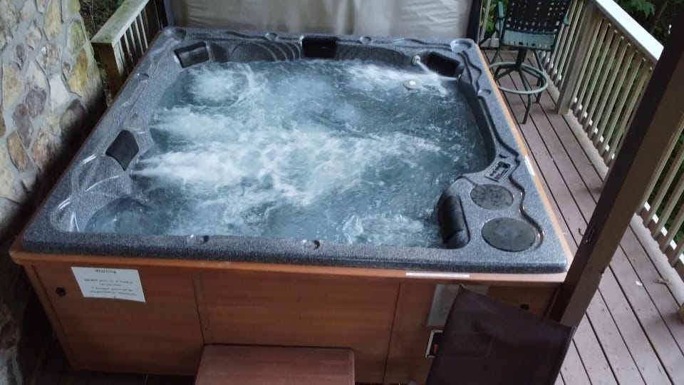Unwind after the day's activities in the bubbling 8 person hot tub by royal spa