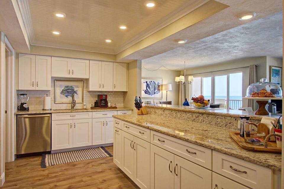Kitchen with new cabinets soft close doors and granite, slide out drawers.