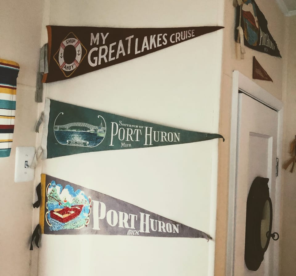 Vintage Port Huron/Lake Huron pennants in the Bunk Room.