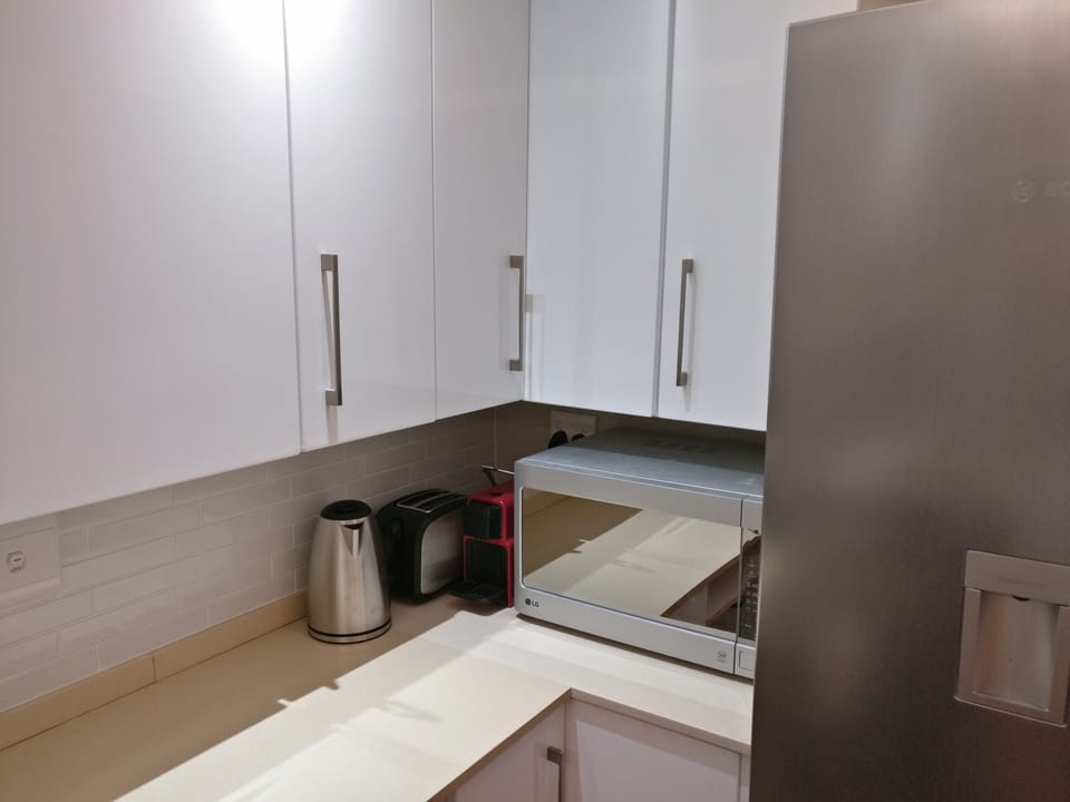 Toaster, kettle, microwave, coffee machine