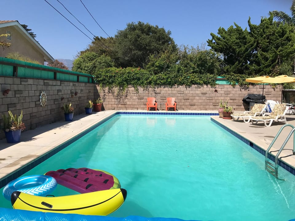 huge private pool in back yard (unheated) with plenty of seating.