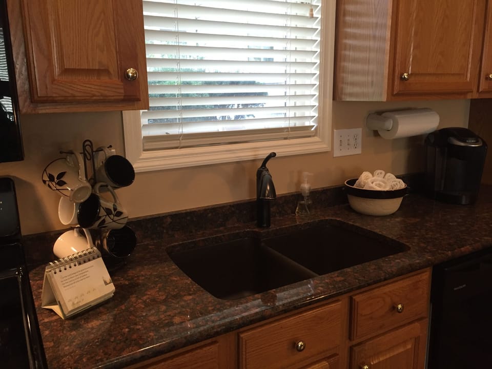Upscale kitchen with coffee maker and all amenities 