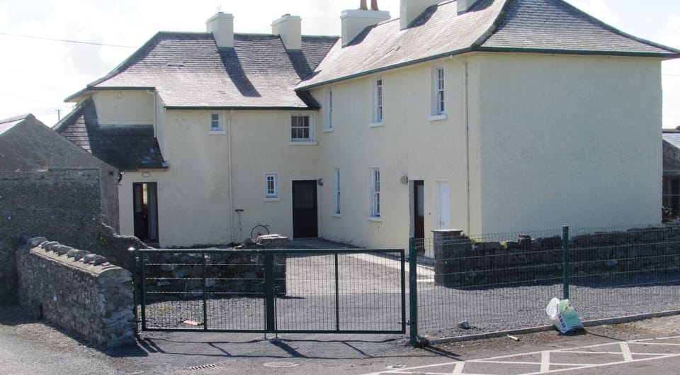 Ample parking in enclosed courtyard at rear. Safe for children and/or pets.