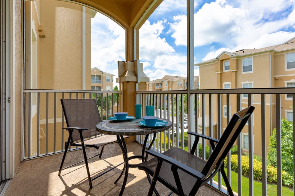 Lanai with bistro style table and  chairs.