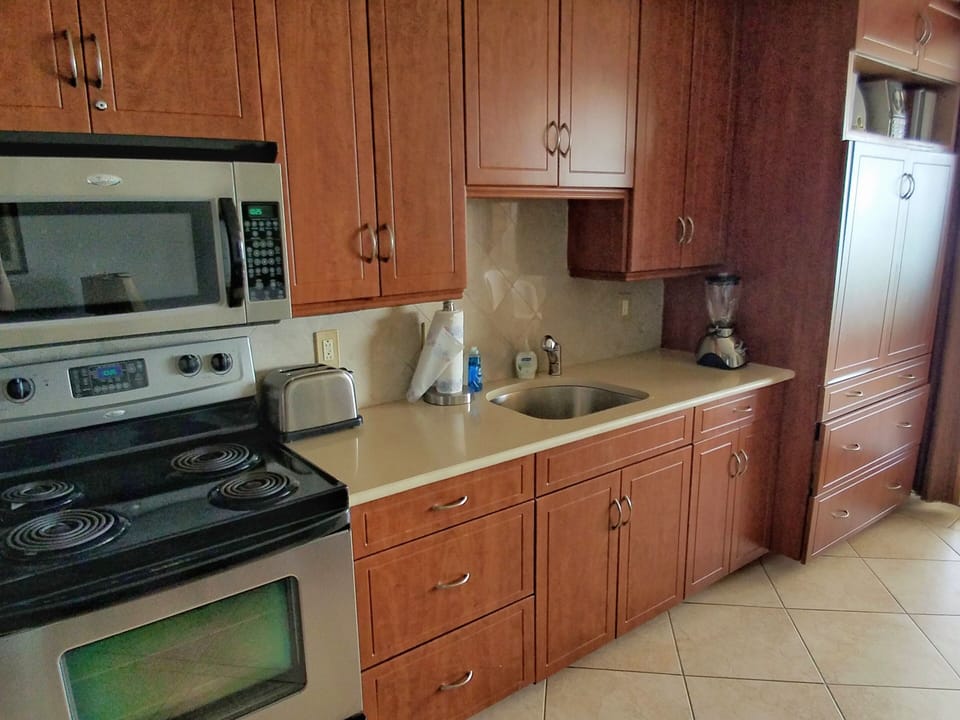 Custom Cabinetry and Entertainment Center with 32" Flat Screen TV and DVD Player