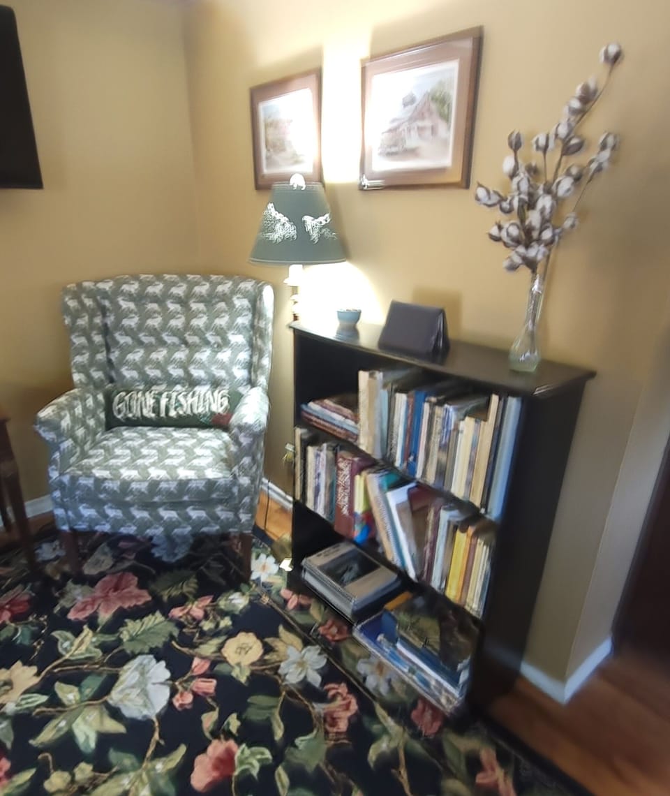 A cozy reading nook and a great personal library!
