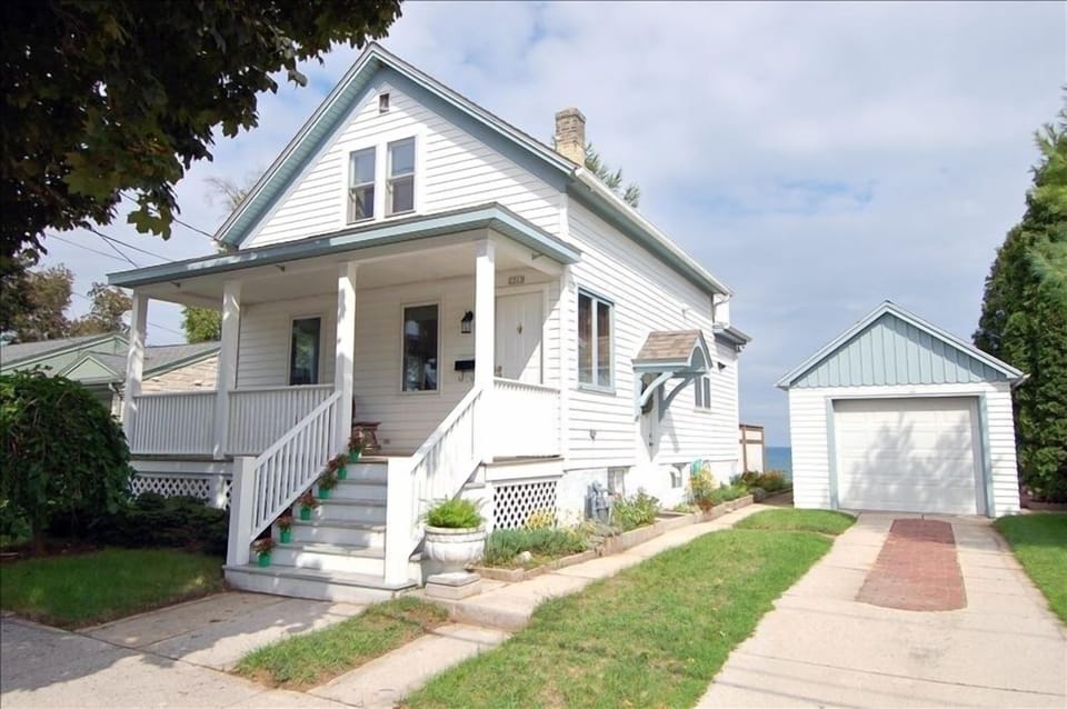 Street view with Front porch and Garage