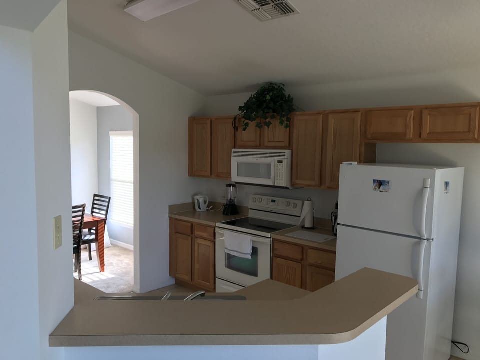 Prepare meals in the fully equipped family kitchen