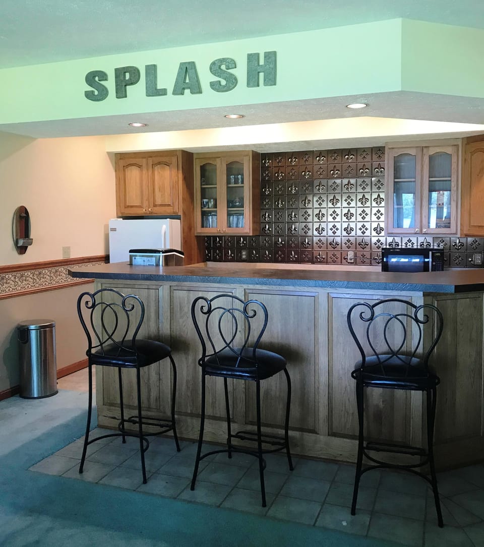 Downstairs bar acts as second kitchen