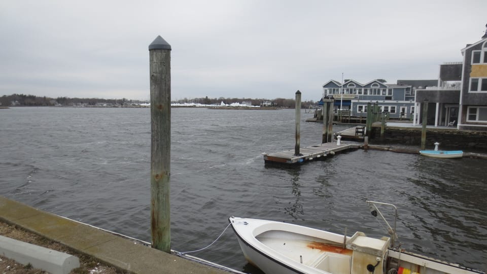 view from end of street.  Wharf Tavern restaurant  seen on the right