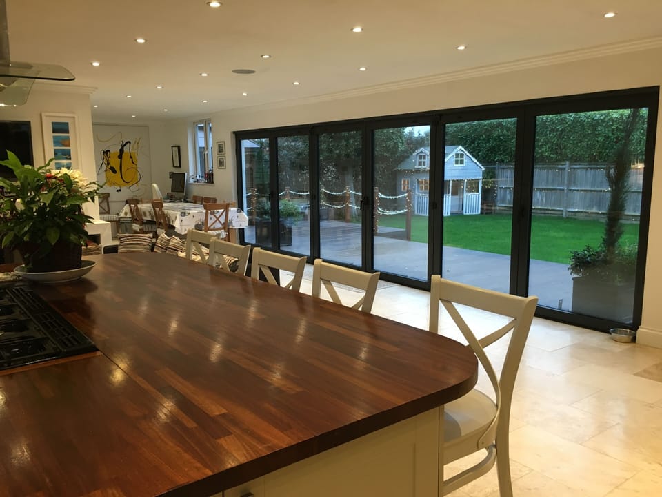Kitchen island and garden view and wendy house. 