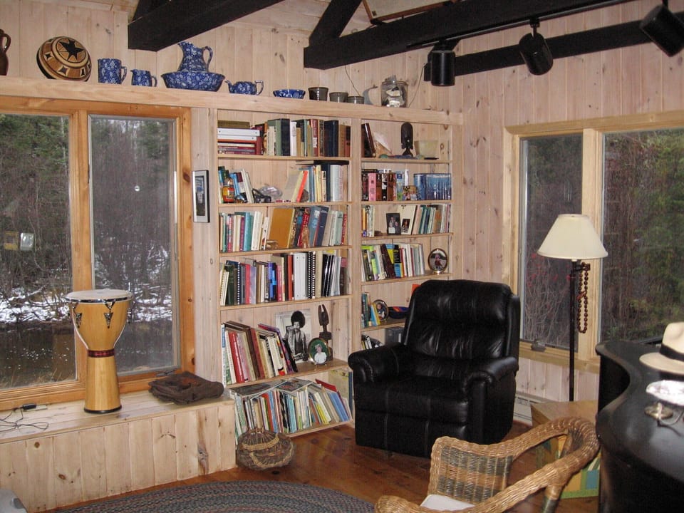 october (notice a little snow off in the distance!) Library and reading chair.