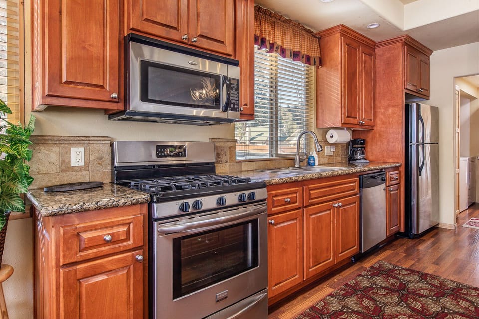 Kitchen with gas burners and full oven