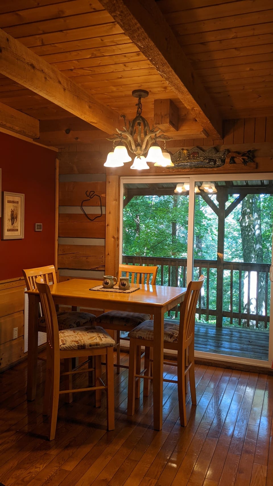 Dining table that seats 4, with a view of our back acreage. So peaceful!