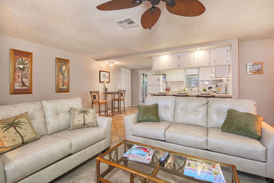 Living room is open to the kitchen area, Screened back patio is just off kitchen