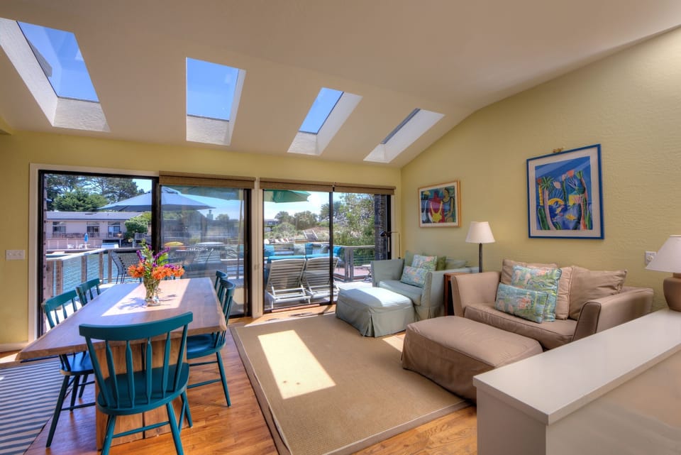 Dining with nearby comfy double sofa chairs that make into twin beds