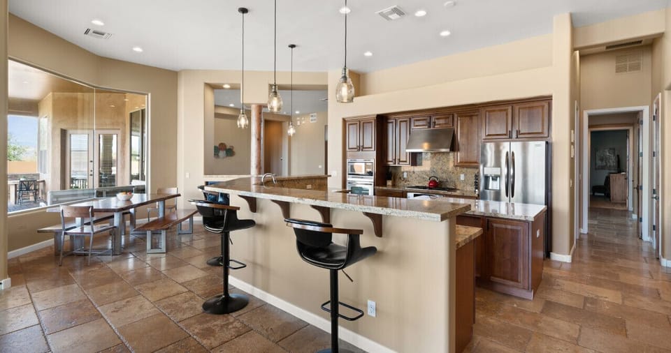 [Kitchen] Large open kitchen with counter seating and dining