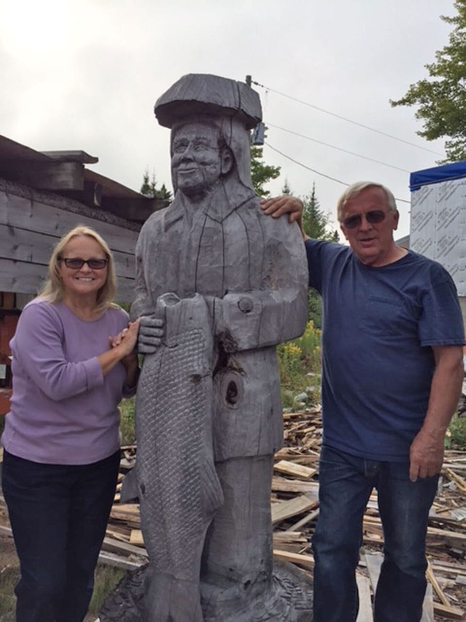 Hosts Sherry & Bob, with statue of Dad.  Developing Dockside is a labor of love.
