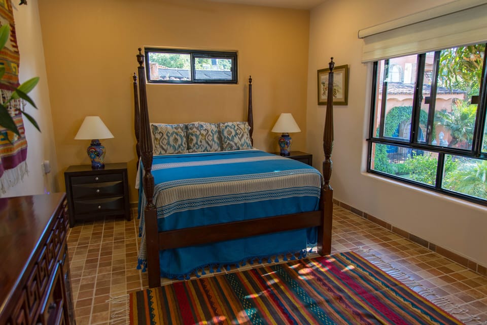 Queen bedroom with ceiling cupola.