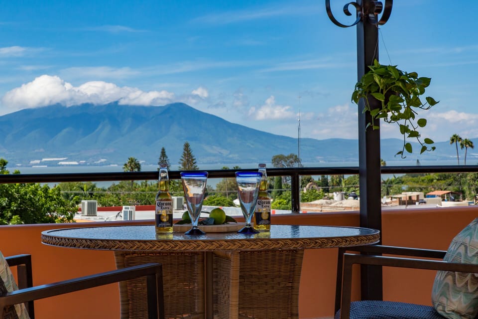 Shared roof patio has great view of lake, mountains and sunset.