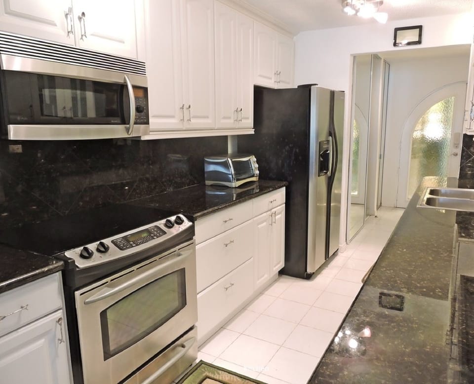 Remodeled kitchen - stainless, granite