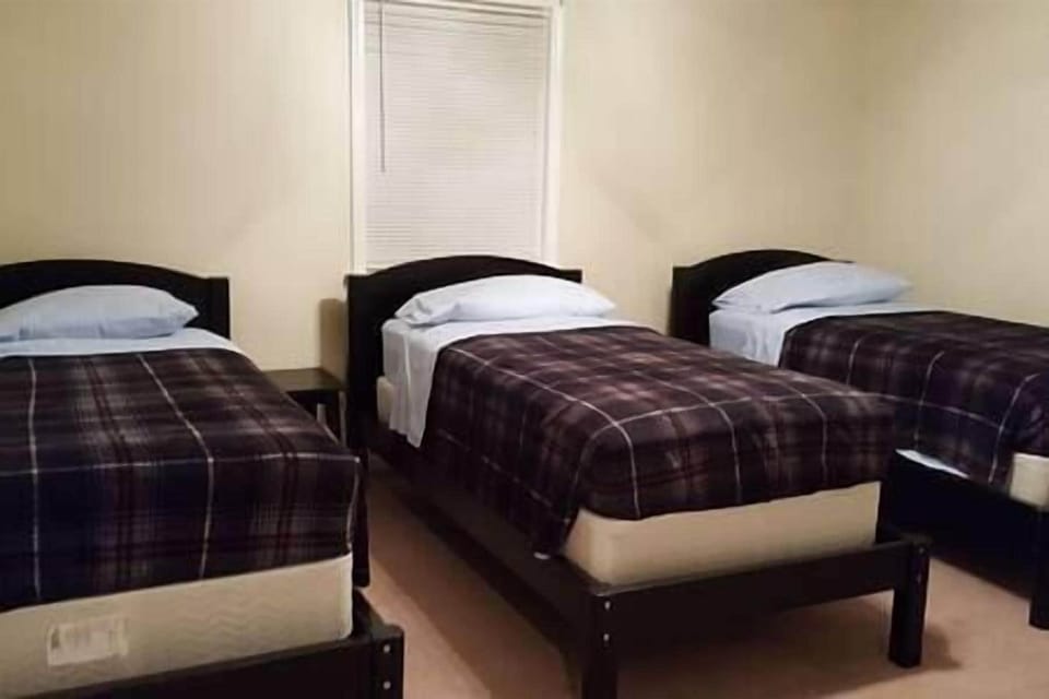 Bedroom #4 - 3 twins/single beds