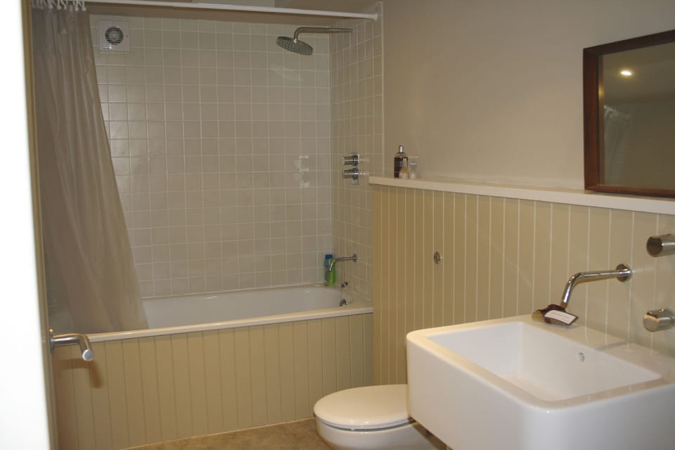 The bathroom with bath and shower