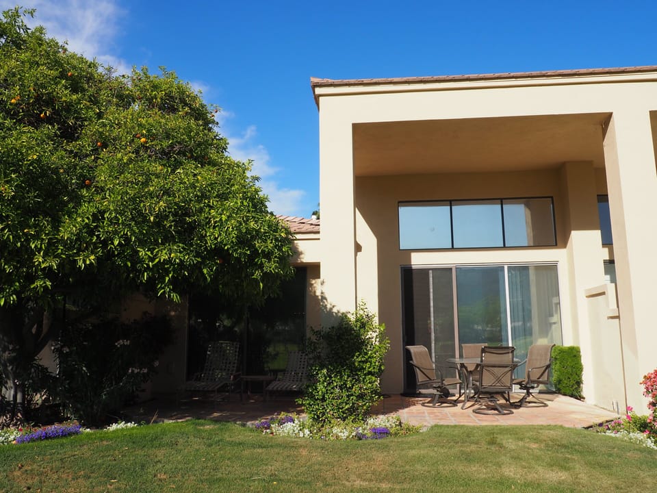 Back Patio located 20 feet from Community Pool and Hot Tub.