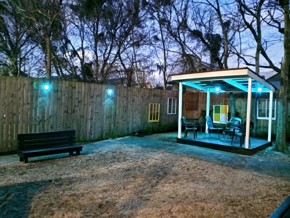Rear courtyard shared with neighboring unit.