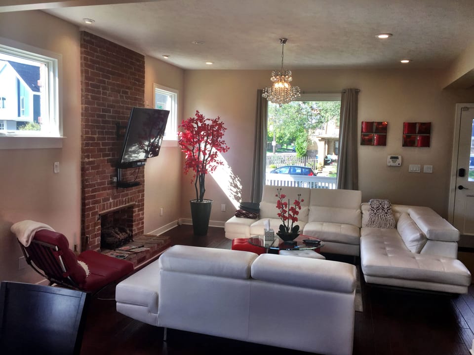 Sunny living room to accommodate a large group in beautiful upscale neighborhood