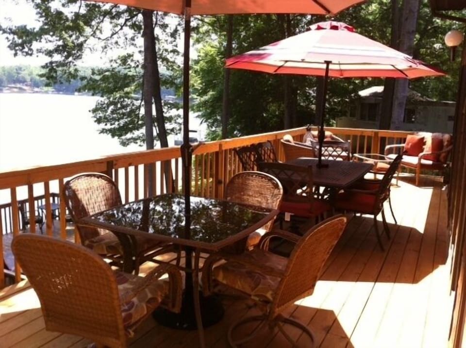 upper deck with two tables seating for 10 people