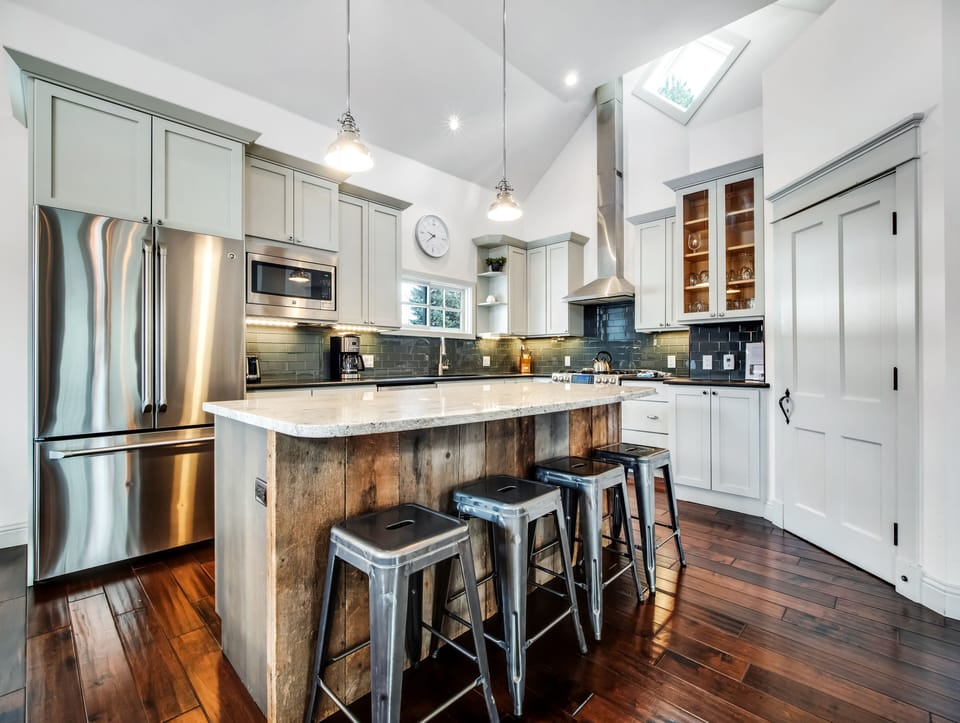 Large, new and clean kitchen with GE Cafe appliances. 