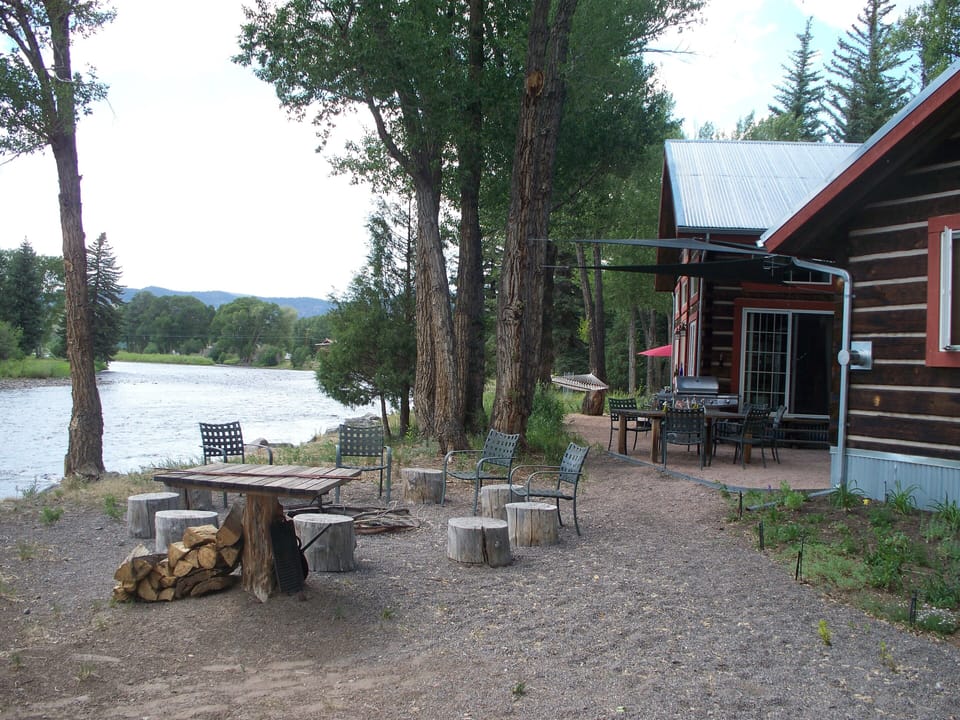 Fire pit area we supply wood for free.  Picnic area is between the cabins