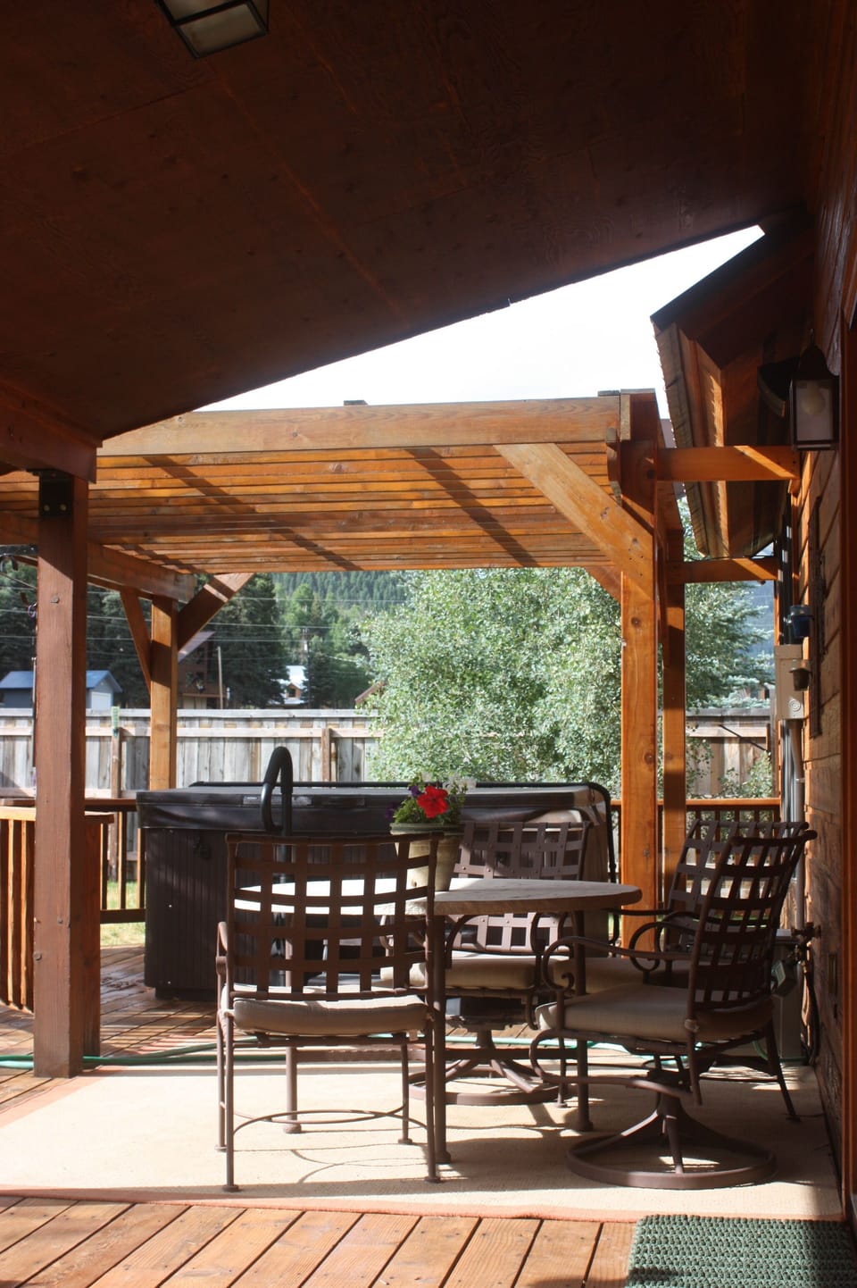 Relax in this beautiful backyard and large hot tub on those cool mountain nights