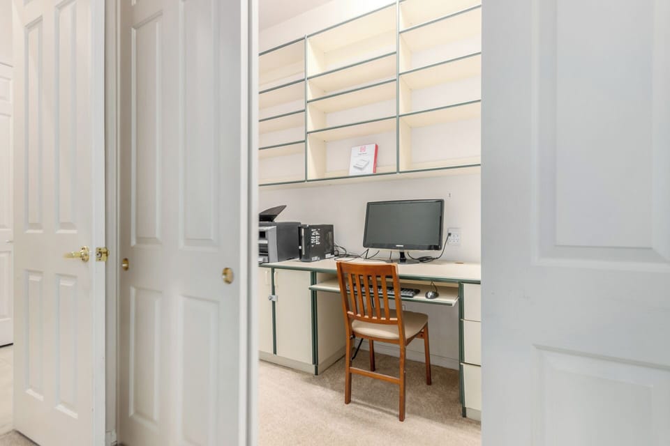 Private work area in BR 1 w/computer, printer, supplies, & across from ensuite. 