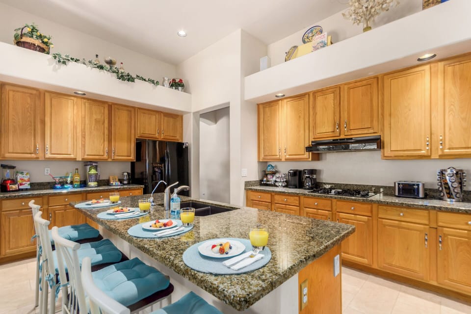 Fully stocked kitchen with complimentary breakfast basket with fresh pastries