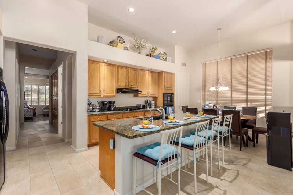 Granite countertop w/ seating for 4 &  dining table for 8, perfect for gathering