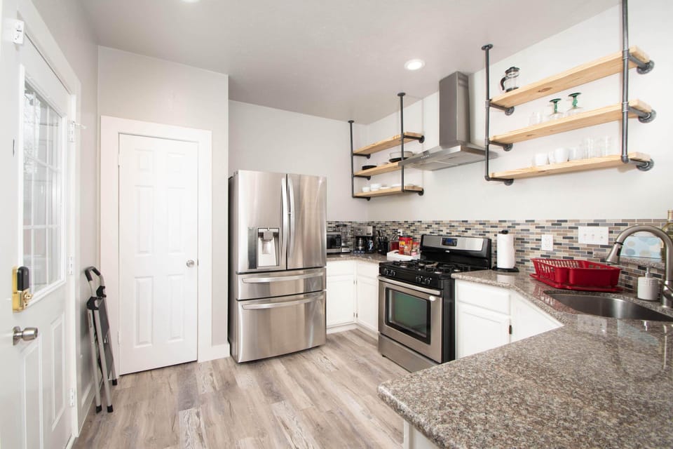 Fully stocked kitchen with all major and small appliances to prepare meals