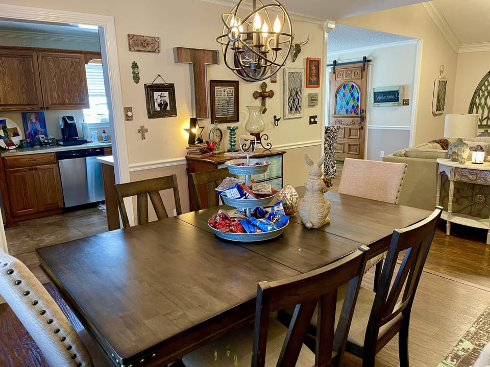 Dining Room- snacks, coffee & water bottles are provided for guests’ enjoyment 