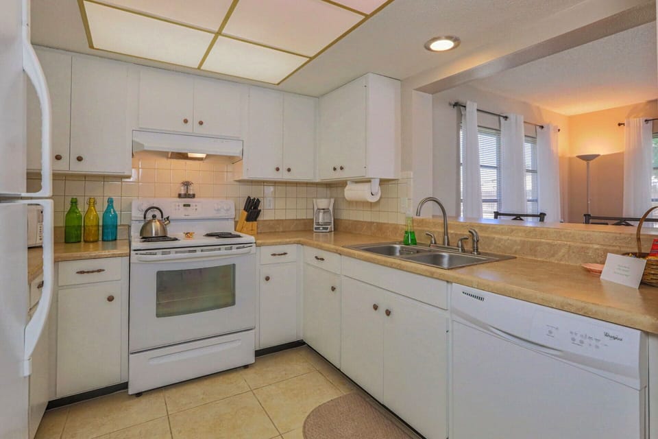 Kitchen is fully stocked for making home cooked meals 