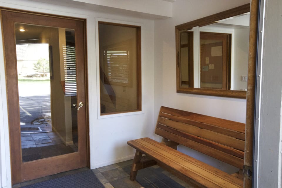 Mud room entry with bench and storage for all your gear.