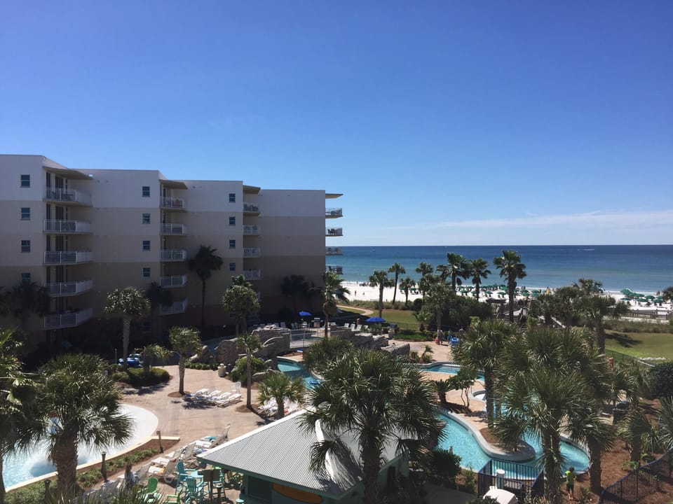 Unit B410 has excellent views of BOTH the Gulf and courtyard pool