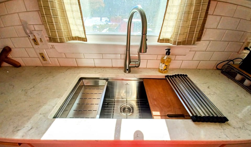 new faucet and workstation sink