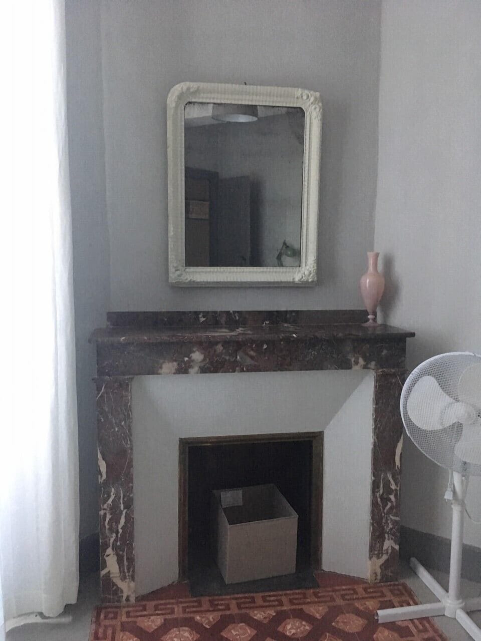 Fireplace detail in a double [kingsize bed] room.