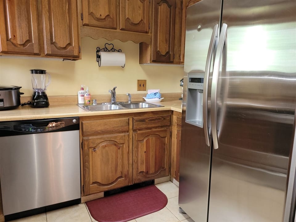 Kitchen - Crockpot, blender, utensils, flatware, and cookware